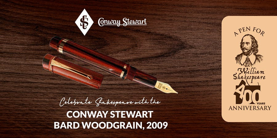 Banner for the Bard Woodgrain pen, a brown wood-grain fountain pen on a wooden surface with a Shakespeare portrait badge