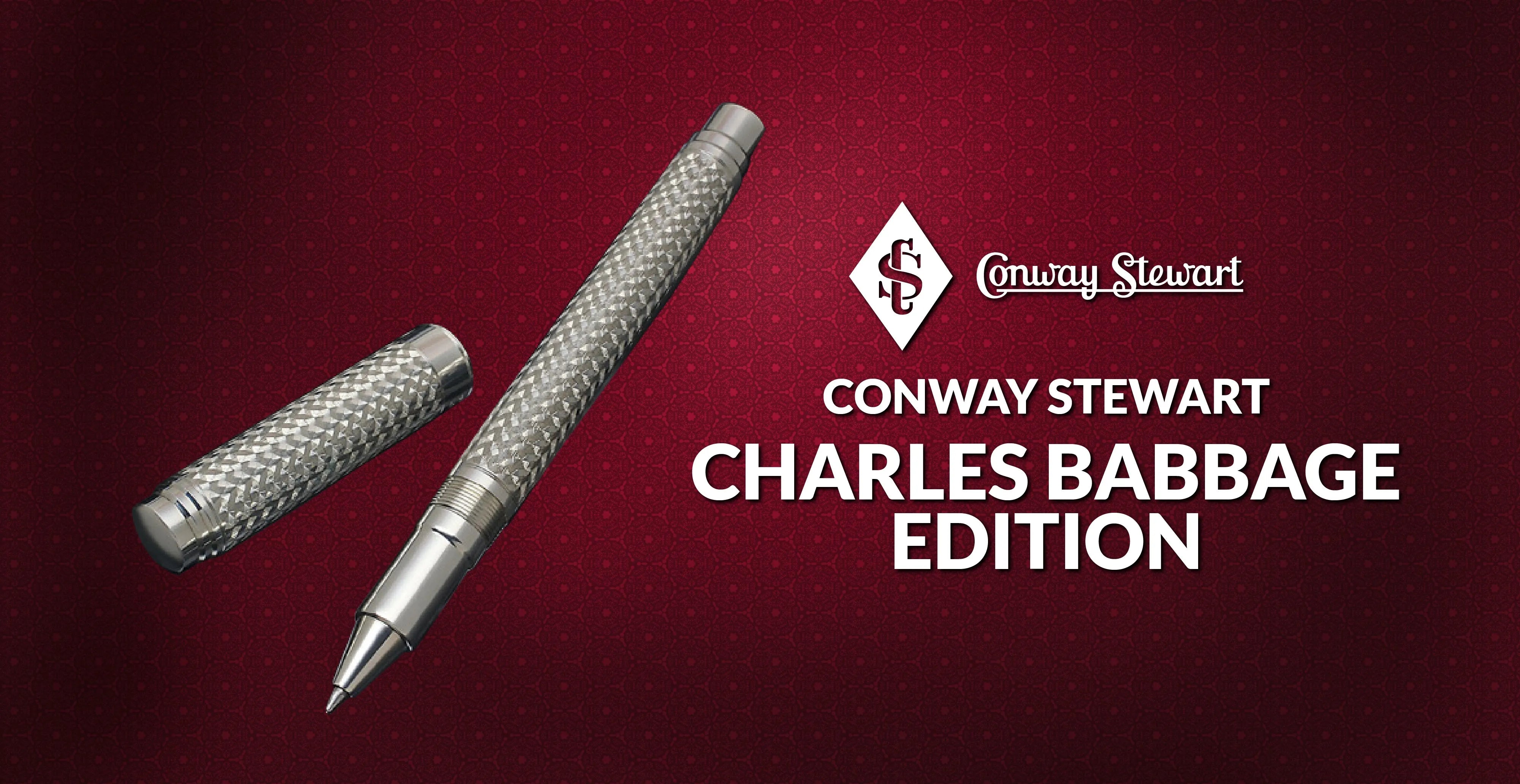 Banner for the Charles Babbage edition, a silver textured fountain pen and rollerball against a dark red backdrop