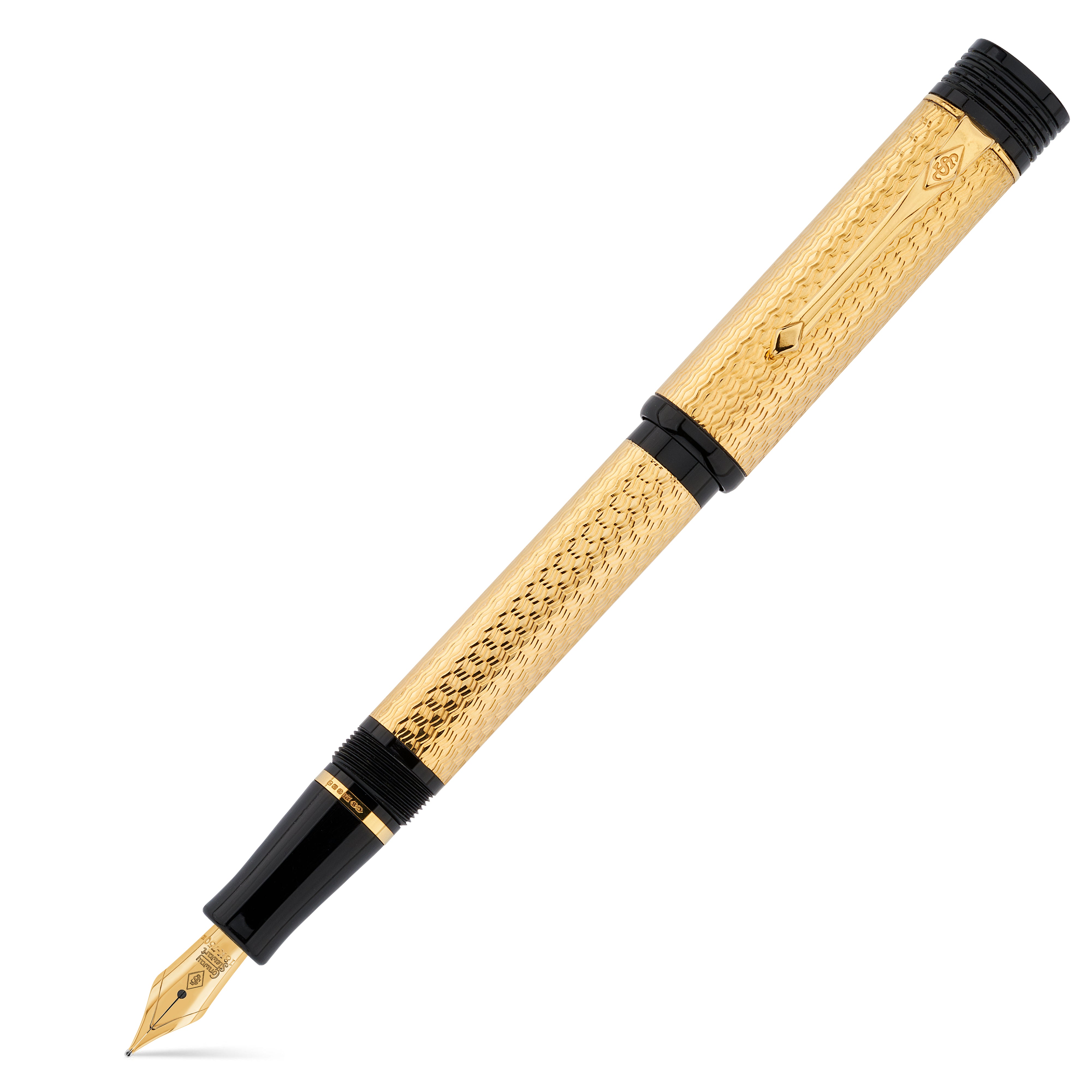 Conway Stewart Churchill Vermeil fountain pen uncapped, gold filigree barrel with black cap and trim