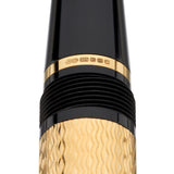 Close-up of the gold cap band hallmarked CS 375 on the Conway Stewart Churchill Vermeil fountain pen