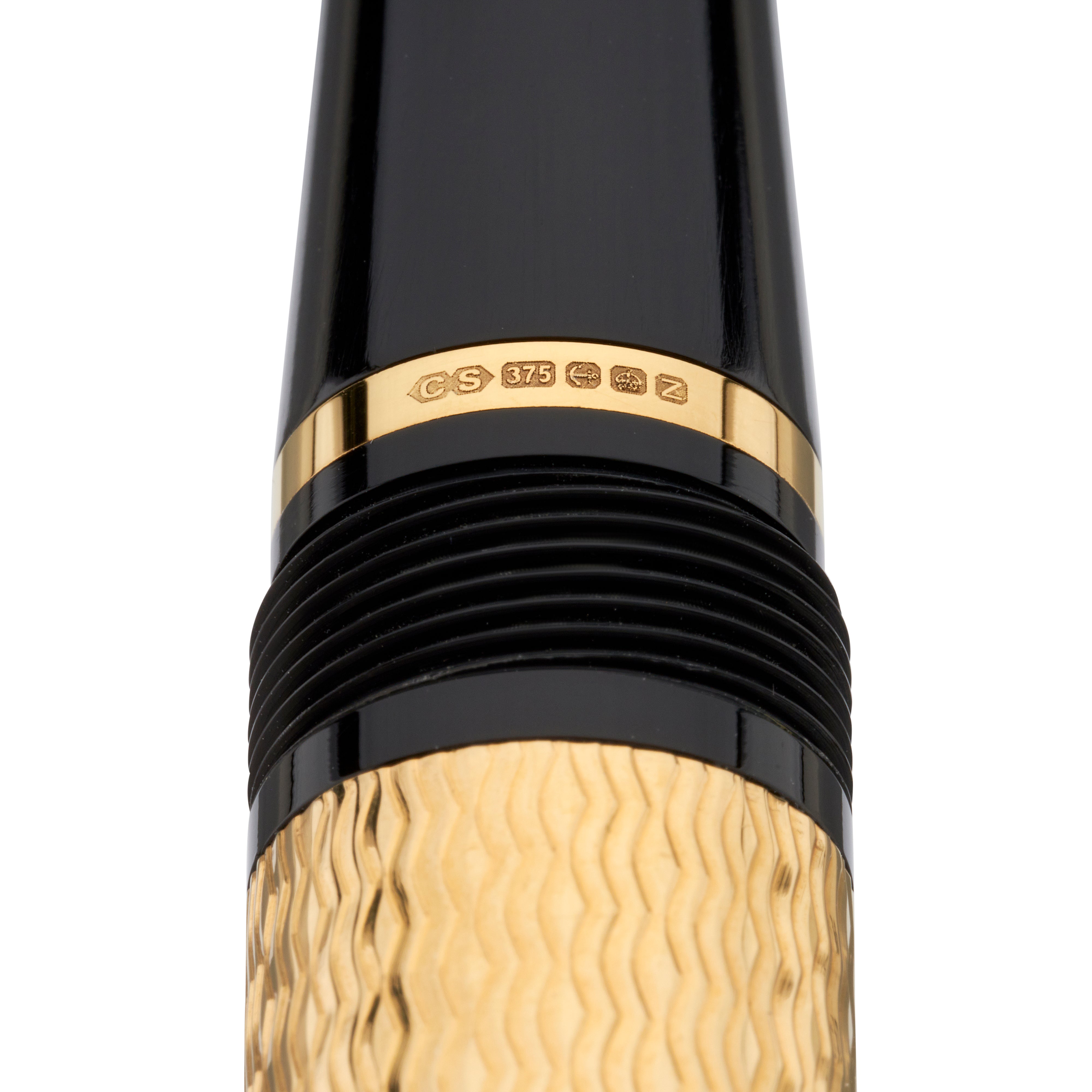 Close-up of the gold cap band hallmarked CS 375 on the Conway Stewart Churchill Vermeil fountain pen