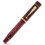 Churchill Burgundy Blush fountain pen capped, angled view of the marbled barrel