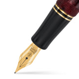 Close-up of the gold nib on the Churchill Burgundy Blush fountain pen