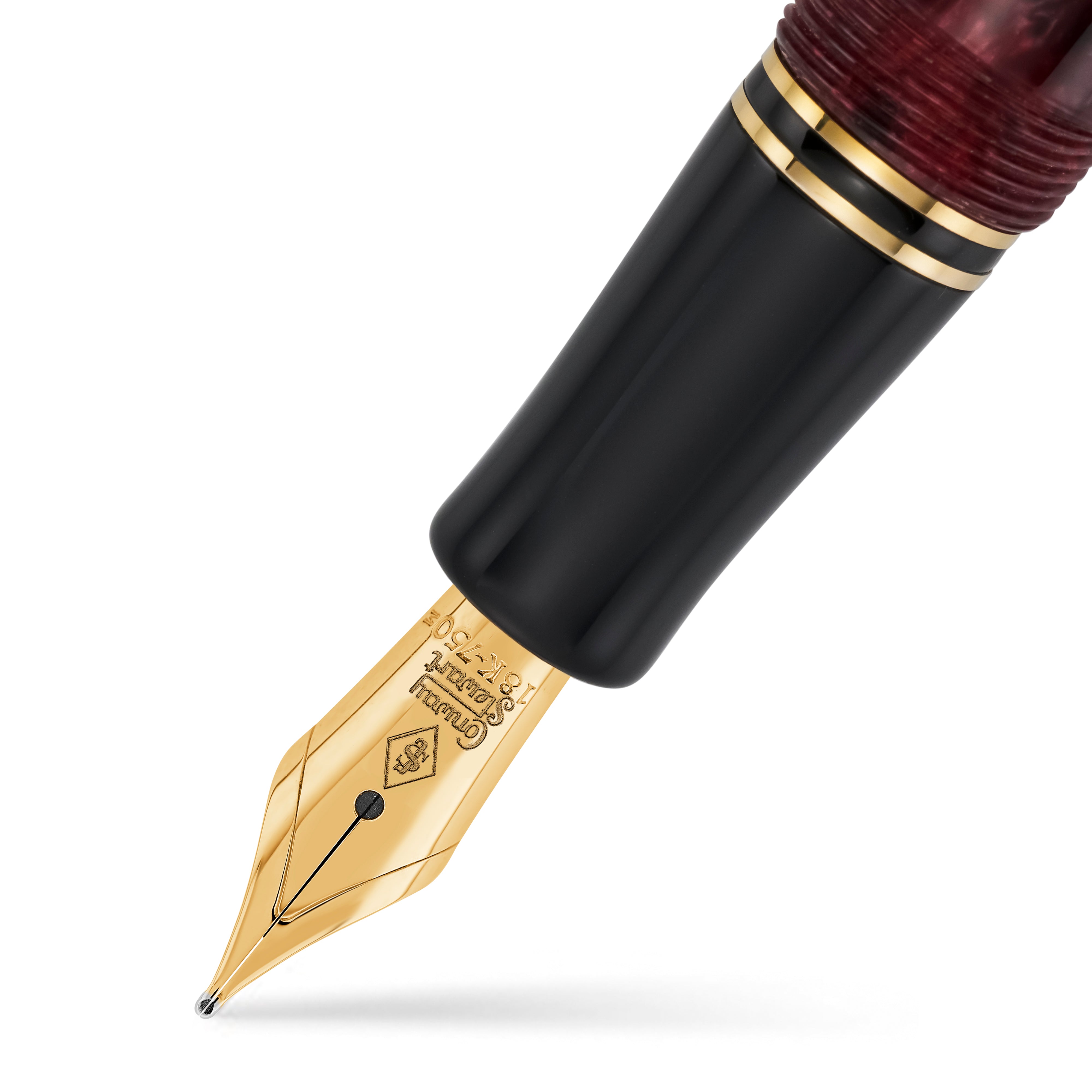 Close-up of the gold nib on the Churchill Burgundy Blush fountain pen
