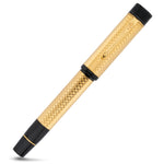 Conway Stewart Churchill Vermeil fountain pen capped, diagonal view showing gold filigree barrel and black trim