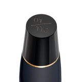 Close-up of a limited edition number 01 of 775 engraved on the cap top