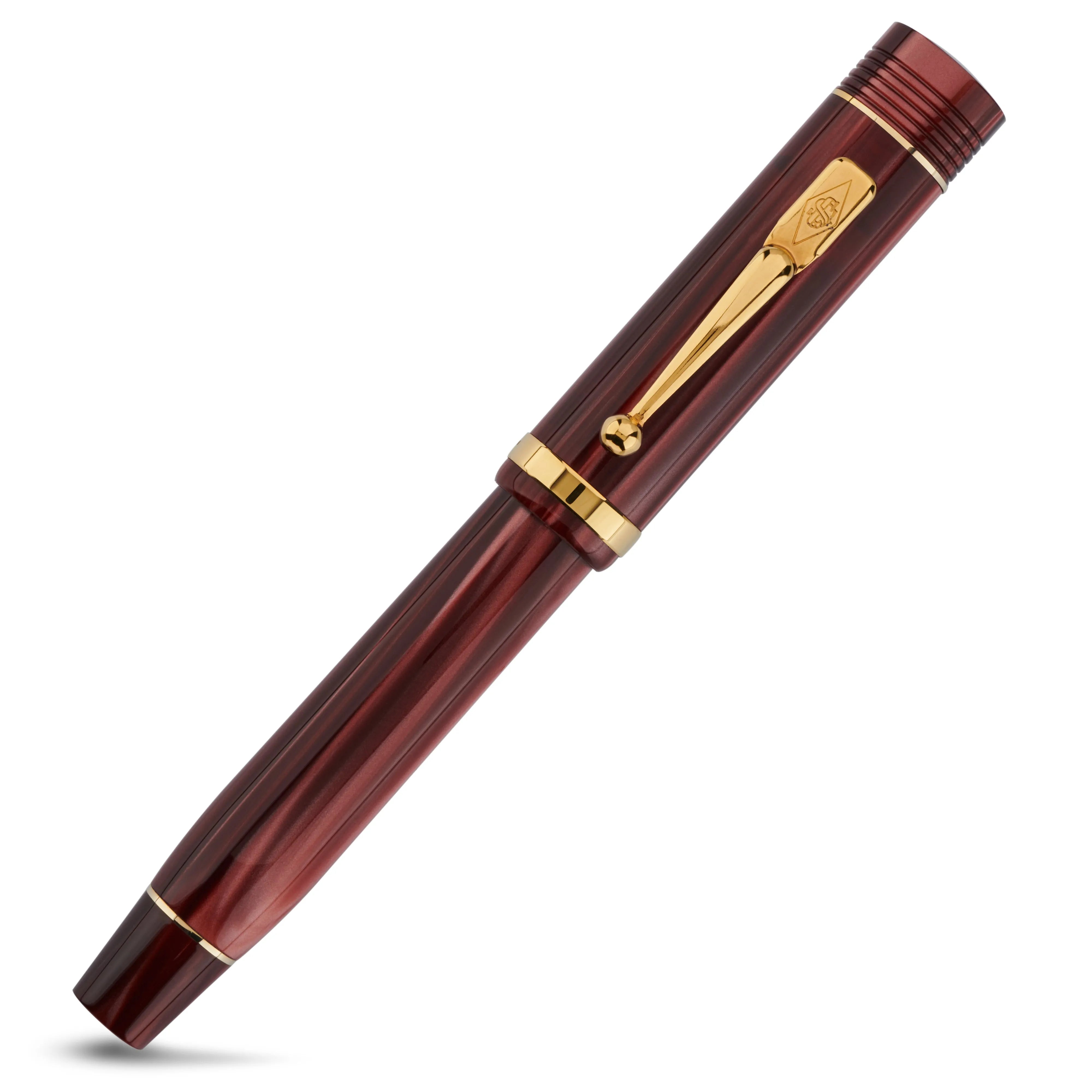 Conway Stewart Churchill Galaxy Silk Füllfederhalter in gedrehtem Blickwinkel, bordeauxrot geriffelte Oberfläche mit Goldakzenten