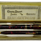 Vintage Conway Stewart London presentation box with burgundy marbled fountain pen, pencil, and guarantee leaflet
