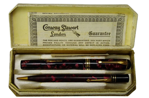 Vintage Conway Stewart London presentation box with burgundy marbled fountain pen, pencil, and guarantee leaflet