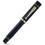 Conway Stewart Churchill Midnight Blue fountain pen from a rotated angle, navy finish with gold trim