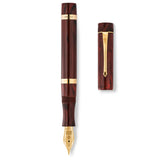 Conway Stewart Marlborough Vintage Rose Ripple Füllfederhalter und Kappe nebeneinander liegend, von oben betrachtet
