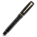 Winston Exmoor fountain pen capped, angled view of the marbled barrel and gold clip