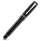 Winston Exmoor fountain pen capped, angled view of the marbled barrel and gold clip