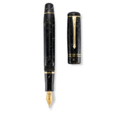Winston Exmoor pen shown capped and uncapped, top-down view revealing the gold nib