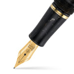 Close-up of the gold nib on the Winston Exmoor fountain pen
