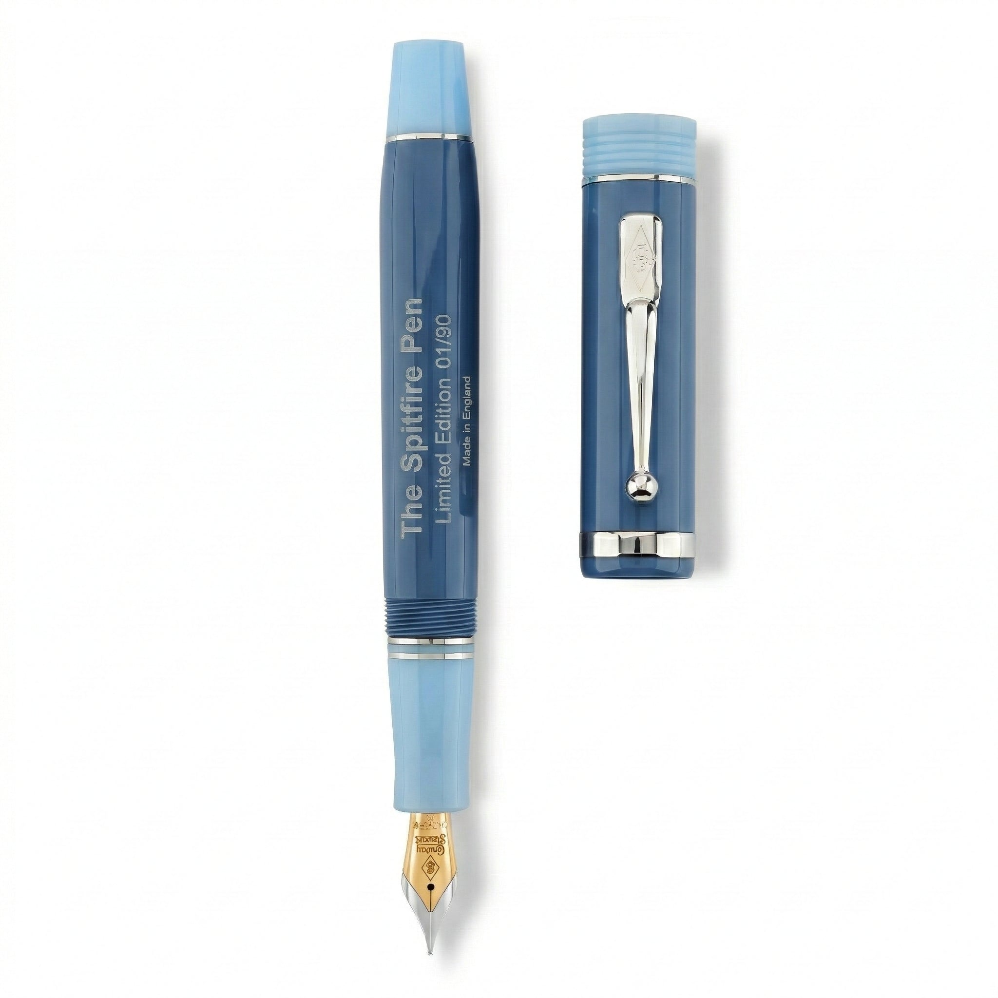 Conway Stewart Spitfire fountain pen and cap laid side by side, showing engraved limited edition barrel text