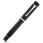 VE-Day fountain pen capped, black textured barrel with chrome trim, angled view