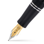 Cap top of the VE-Day pen engraved with a poppy motif in red enamel