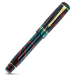 Winston Red Whirl fountain pen capped, angled view of the teal and red swirled barrel