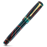 Winston Red Whirl fountain pen capped, angled view of the teal and red swirled barrel