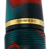 Close-up of the gold cap band stamped CS375 on the Winston Red Whirl fountain pen