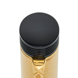 Close-up of the black cap top on the Conway Stewart Churchill Vermeil fountain pen, gold filigree barrel below
