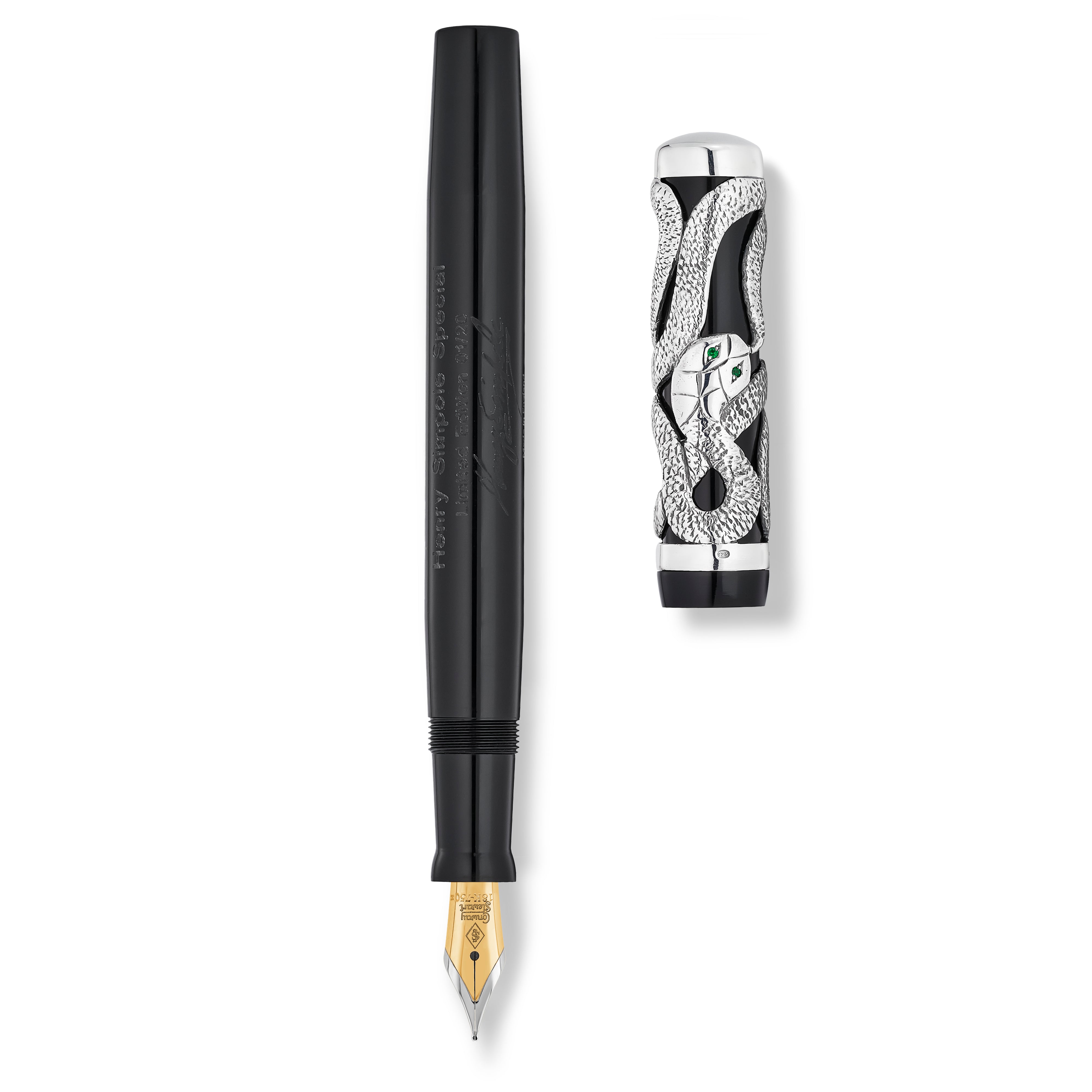 Pen and cap laid side by side, nib exposed, serpent cap design shown separately