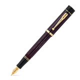 Their Finest Hour Bordeaux Fountain Pen on white background, nib to the lower left, engraved barrel and gold clip visible