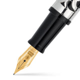 Close-up of the 14ct gold nib engraved with the Conway Stewart crest, black grip section above