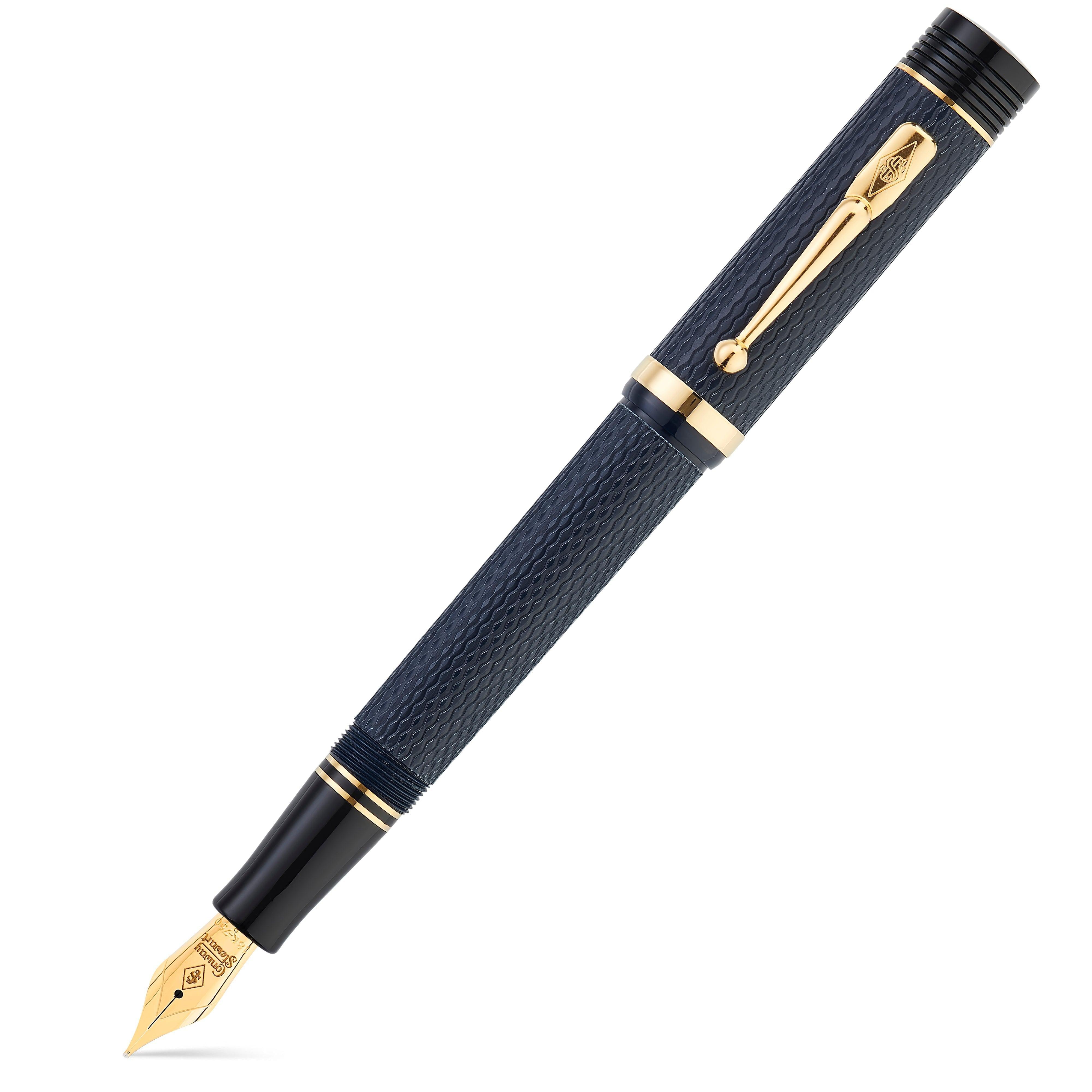 Capped Churchill Blue Chased fountain pen shown diagonally, navy engine-turned texture with gold trim