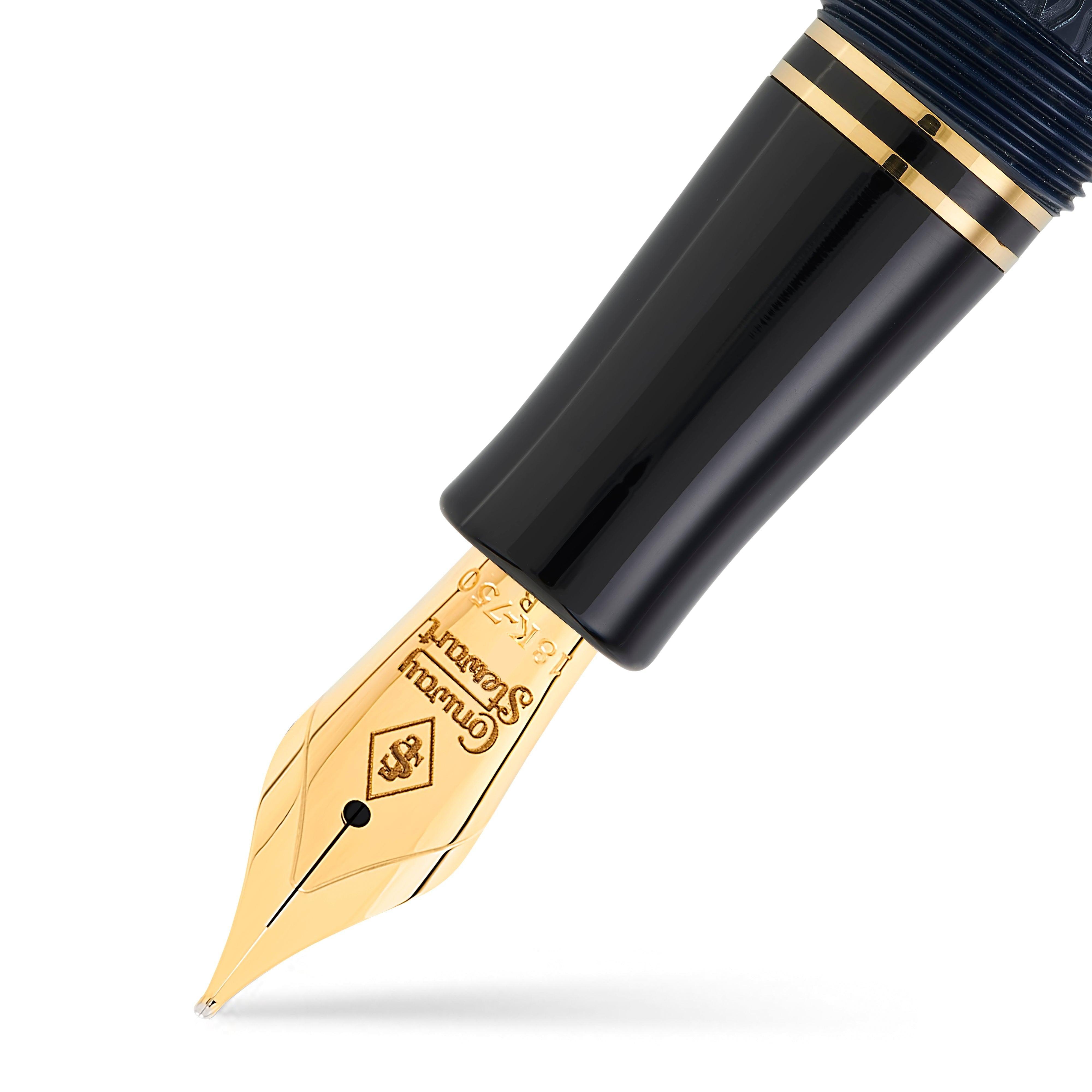 Macro view of the gold nib, engraved Conway Stewart, on the Churchill Blue Chased fountain pen