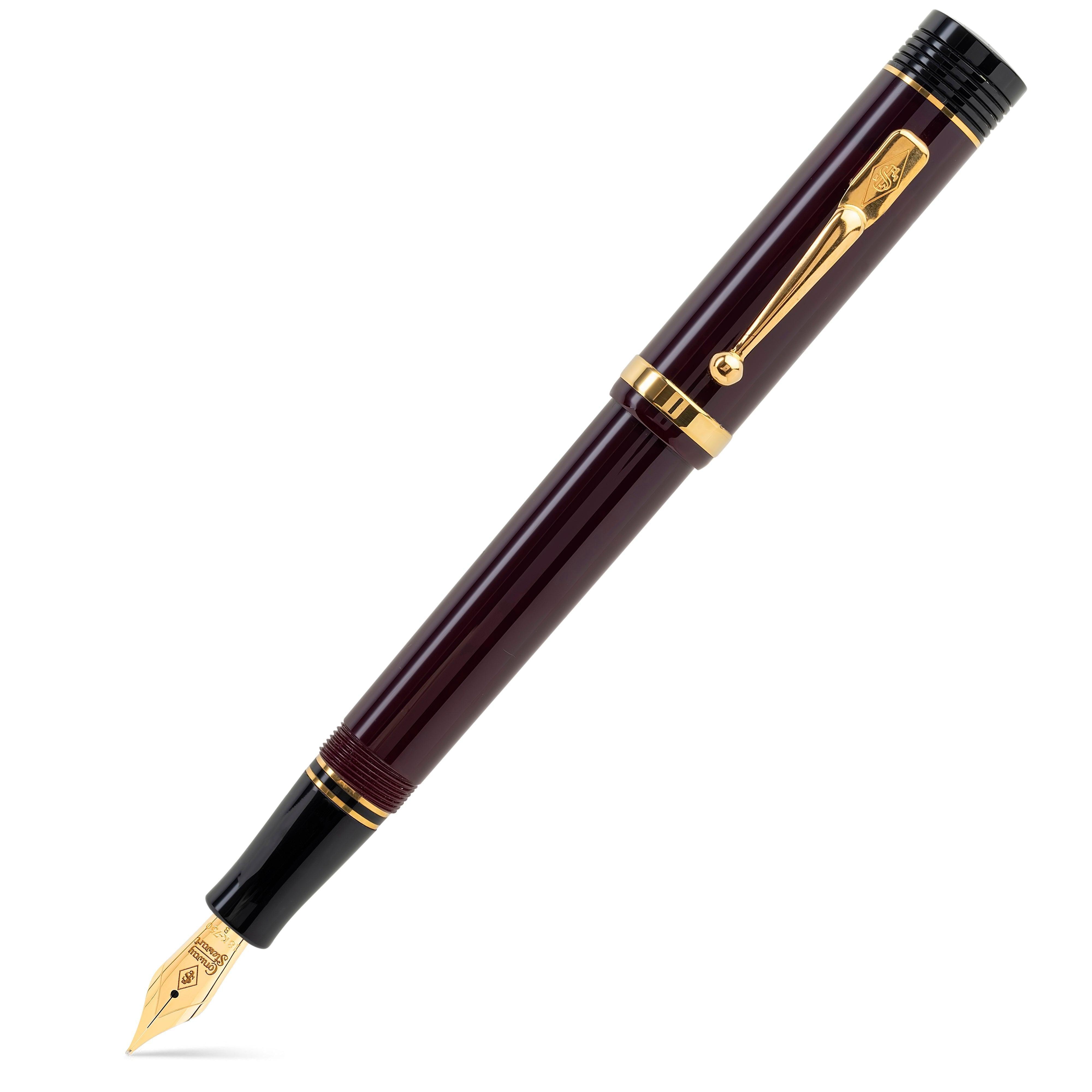 Churchill Bordeaux fountain pen capped, diagonal view of the deep burgundy barrel with gold trim