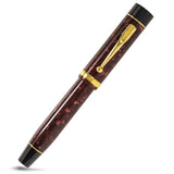 Churchill Burgundy fountain pen capped, showing the gold clip against marbled burgundy acrylic