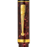 Close-up of the gold clip engraved with the Conway Stewart diamond crest