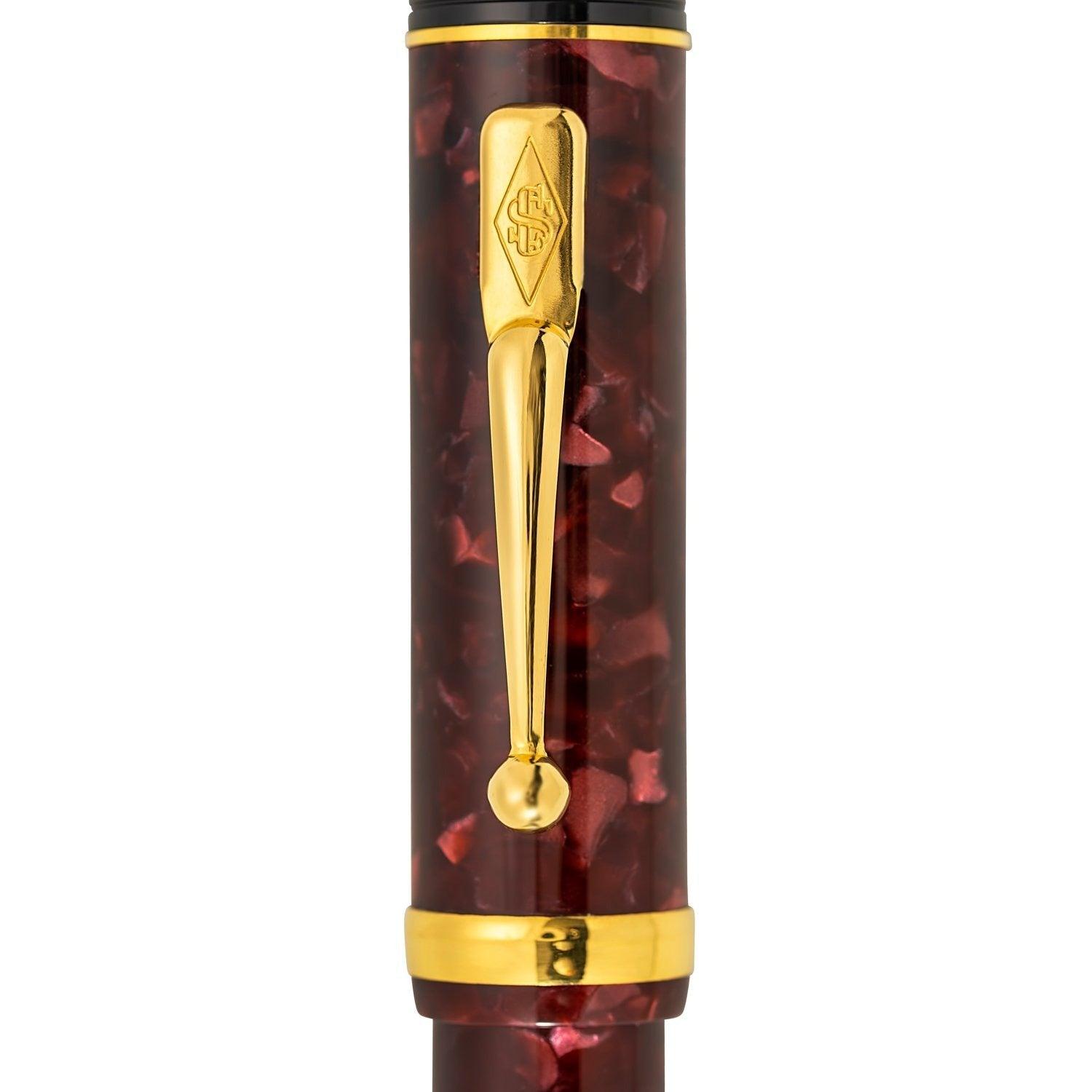 Close-up of the gold clip engraved with the Conway Stewart diamond crest
