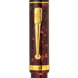 Close-up of the gold clip engraved with the Conway Stewart diamond crest