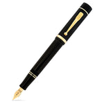 Conway Stewart Churchill Classic Black Gold fountain pen, capped, shown diagonally with gold-plated trim
