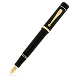 Conway Stewart Churchill Classic Black Gold fountain pen, capped, shown diagonally with gold-plated trim