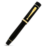 Churchill Classic Black Gold fountain pen capped, shown from a slightly rotated angle showing the glossy black finish