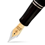 Close-up of the Churchill Classic Black Silver gold nib beneath the black cap and silver-tone band