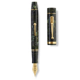 Churchill Classic Green Lever-Fill fountain pen shown uncapped beside its cap, flat lay view