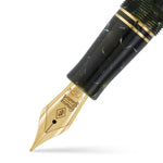 Close-up of the gold nib engraved Conway Stewart on the Churchill Classic Green Lever-Fill pen