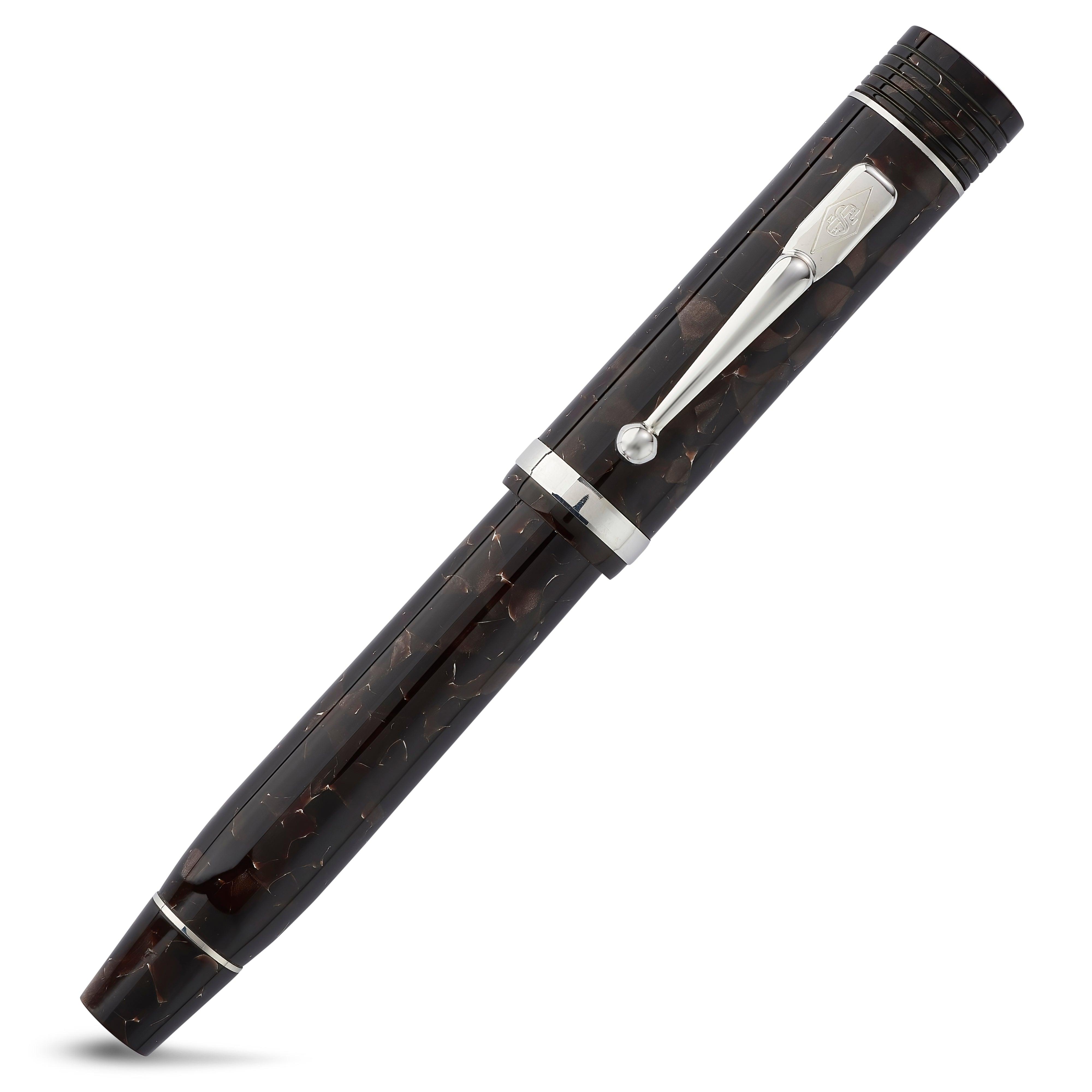 Churchill Dartmoor Silver fountain pen capped, showing the chrome clip against marbled acrylic