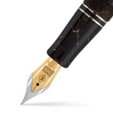 Close-up of the gold nib engraved Conway Stewart on the Churchill Dartmoor Silver fountain pen
