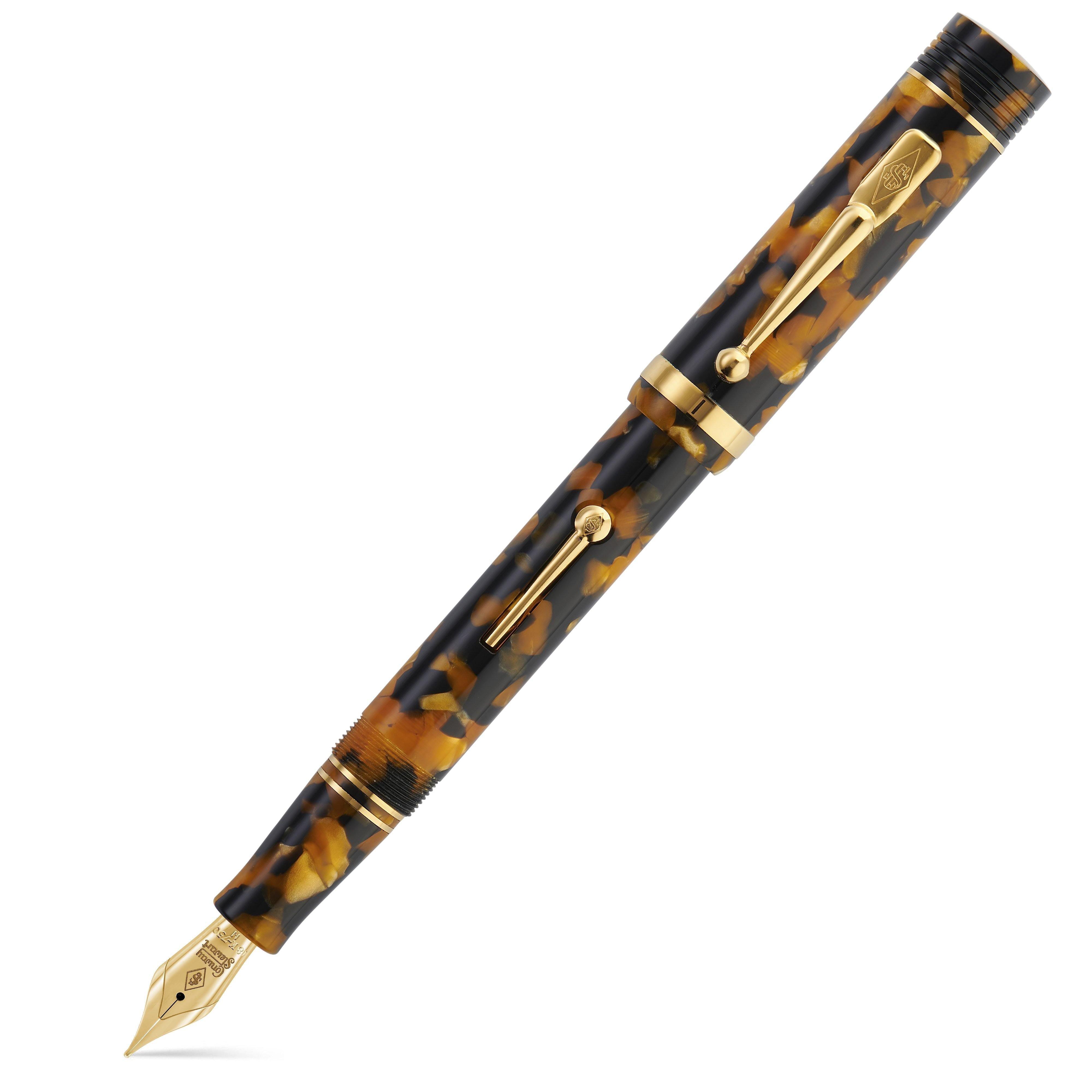 Churchill Honey Noire Lever-Fill pen capped, diagonal view of the honey and black mottled barrel with gold lever