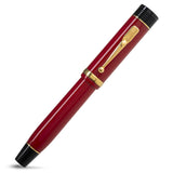 Churchill Modena Red fountain pen fully capped, diagonal view of the red barrel and gold trim