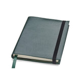 Green leather Conway Stewart notebook closed, angled view showing the elastic strap and ribbon marker