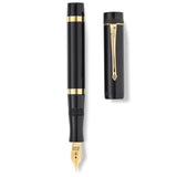 Marlborough Vintage Black Ebonite Gold fountain pen barrel and cap laid side by side, overhead flat lay