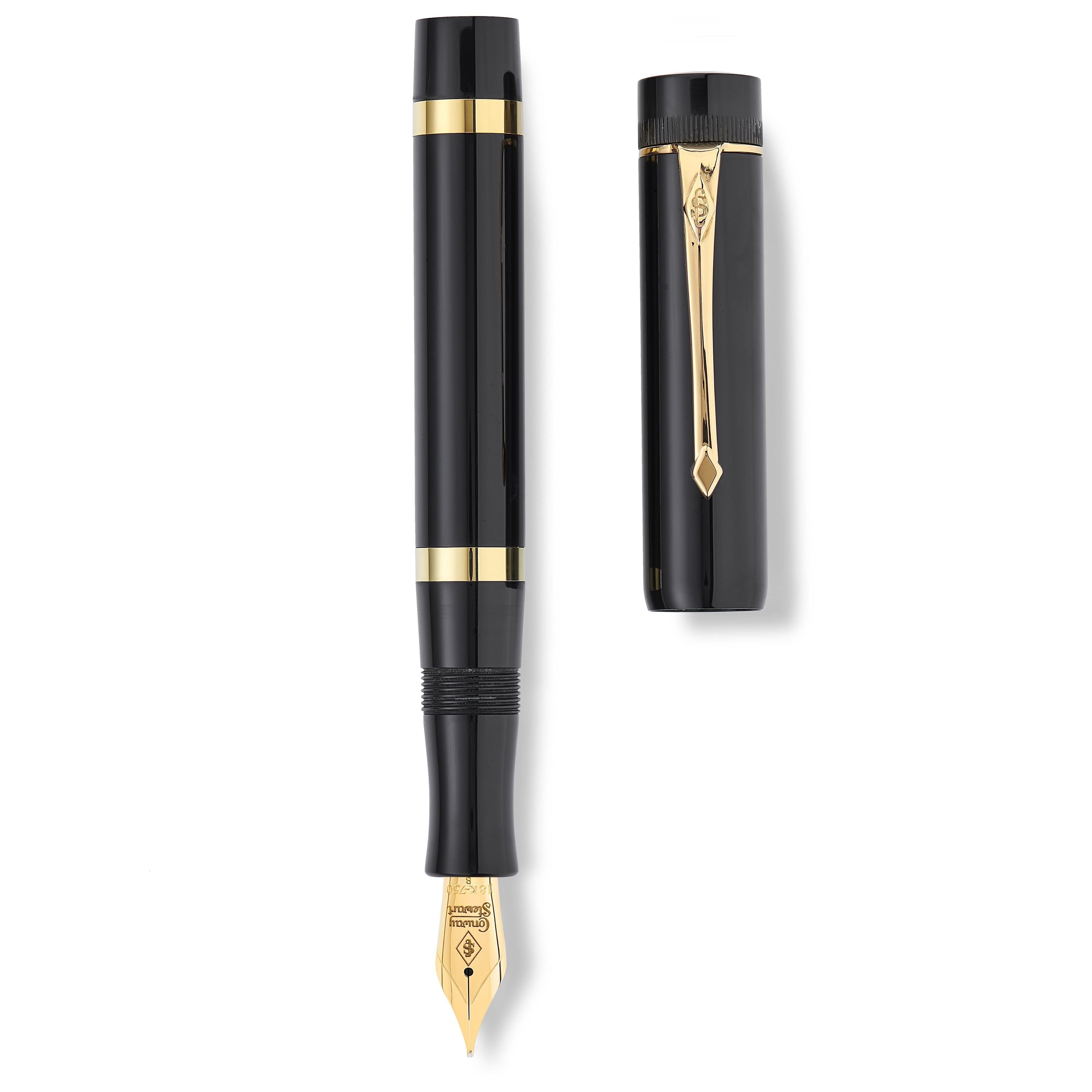 Marlborough Vintage Black Ebonite Gold fountain pen barrel and cap laid side by side, overhead flat lay