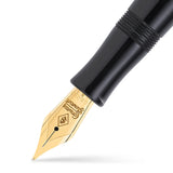Macro view of the gold nib, engraved Conway Stewart, on the Marlborough Vintage Black Ebonite Gold fountain pen